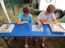 Spiel: Schlangen und Leitern.